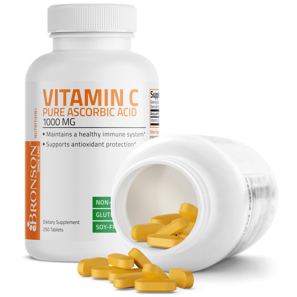 Bronson Vitamin C 1000mg glass with tablet reflecting natural light