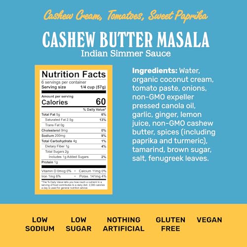 Brooklyn Delhi Golden Coconut Curry simmering in a pan with creamy coconut and cashew butter