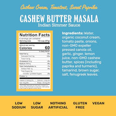 Brooklyn Delhi Golden Coconut Curry simmering in a pan with creamy coconut and cashew butter