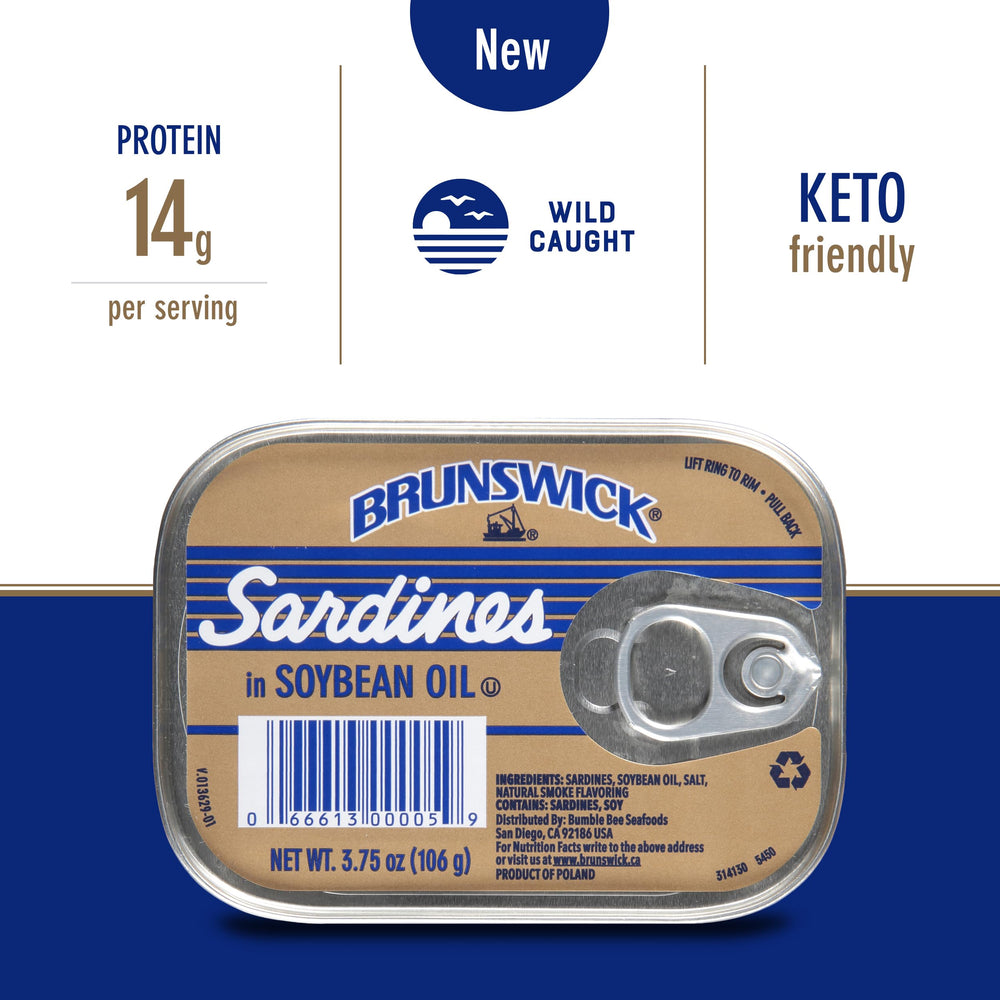 Brunswick sardines open can closeup, classic pantry favorite.