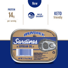 Brunswick sardines open can closeup, classic pantry favorite.