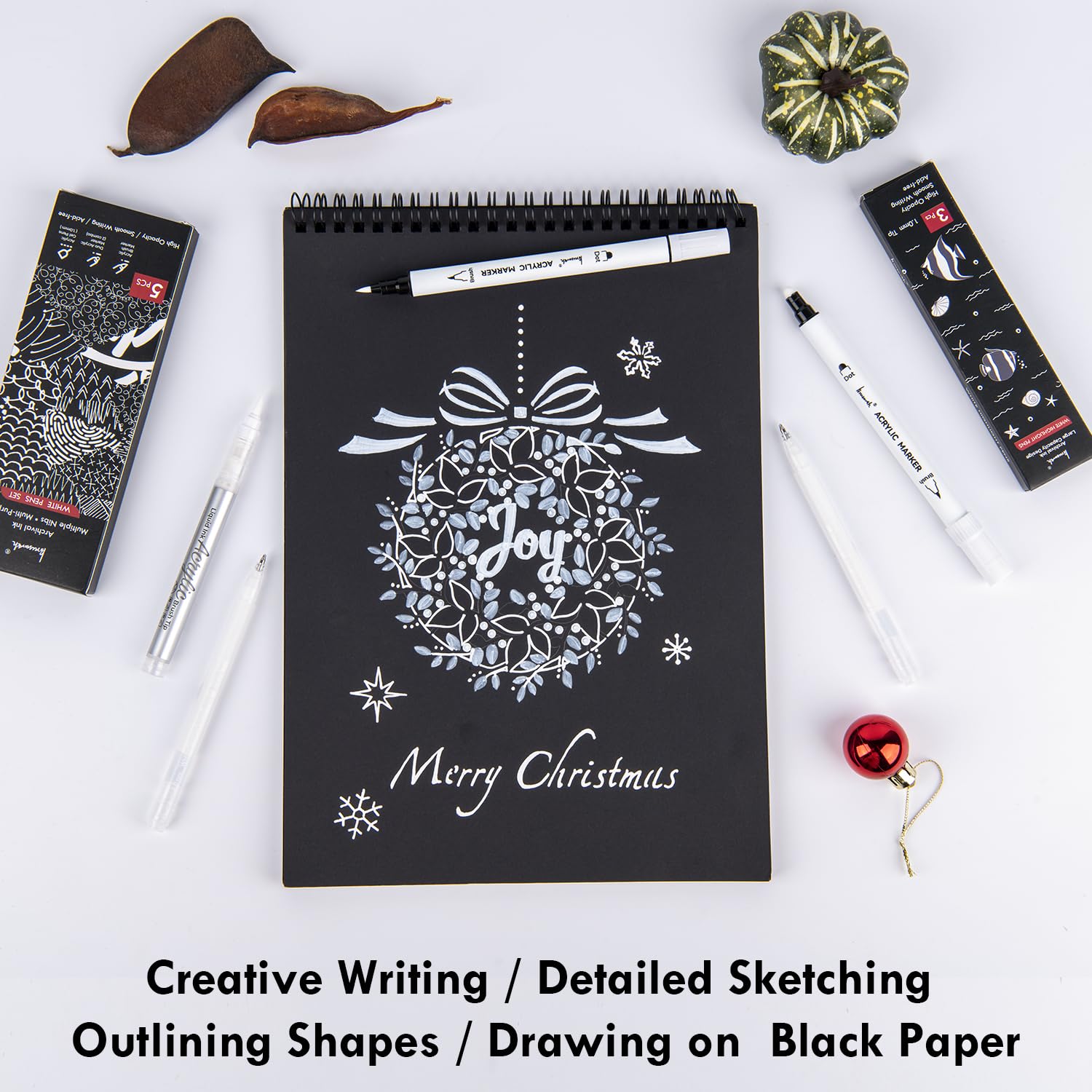 Brusarth white ink brush-tip pens used on black paper for highlights