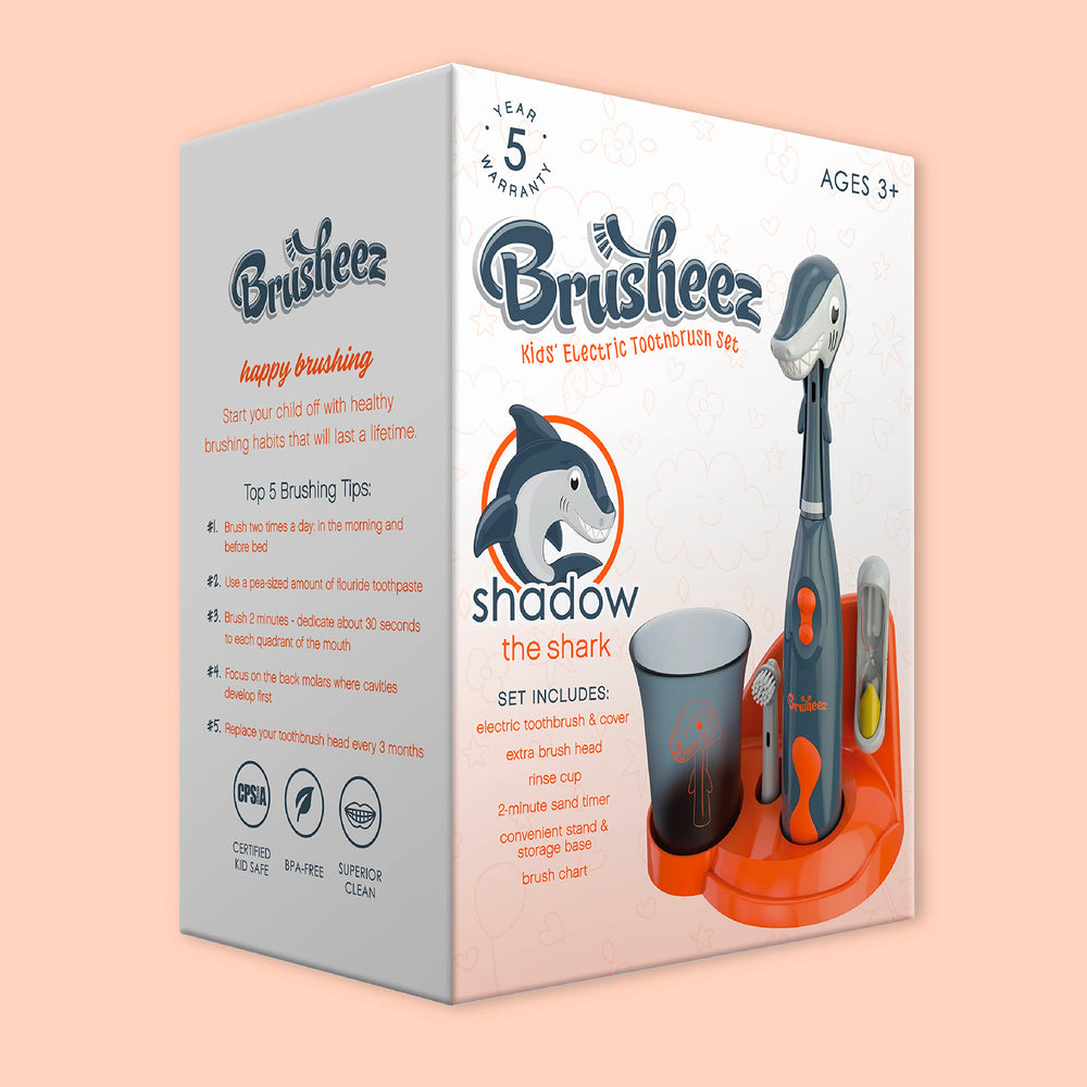 Brusheez Shadow the Shark packaging contents include brush heads and chart