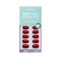 BTArtbox Cardinal red nails and glue tube close-up highlights long-lasting wear option