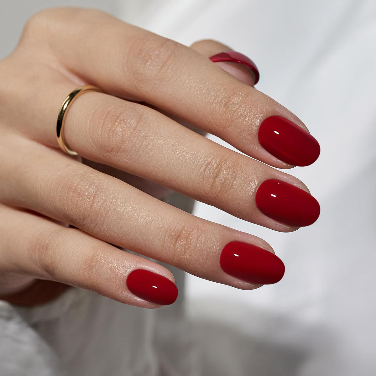 BTArtbox Cardinal red press-on nails close-up with glossy gel finish for salon-like look