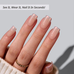 BTArtbox close-up of muted-glitz nails with nude chrome tip for natural blend and easy wear.