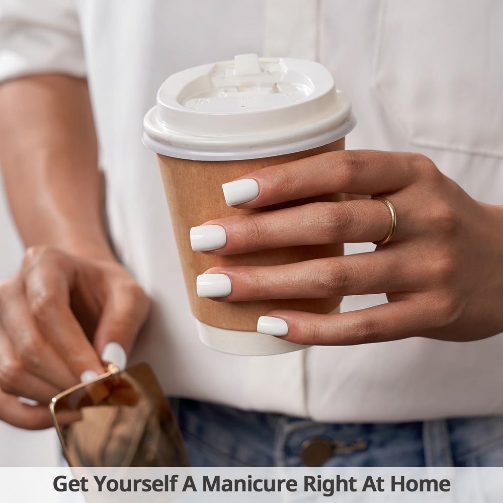 BTArtbox square press-on nails in pastel white on fingers for a natural, seamless look.