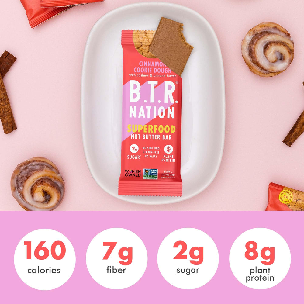 B.T.R. Nation Cinnamon Cookie Dough bar held in hand for everyday energy