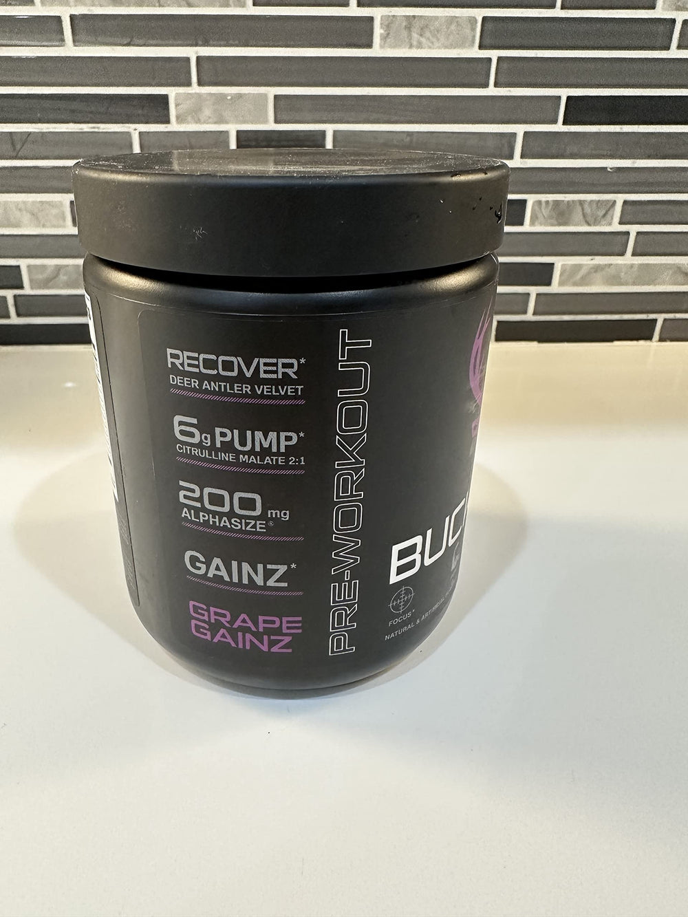 Bucked Up Pre Workout grape label close-up showing ingredients.