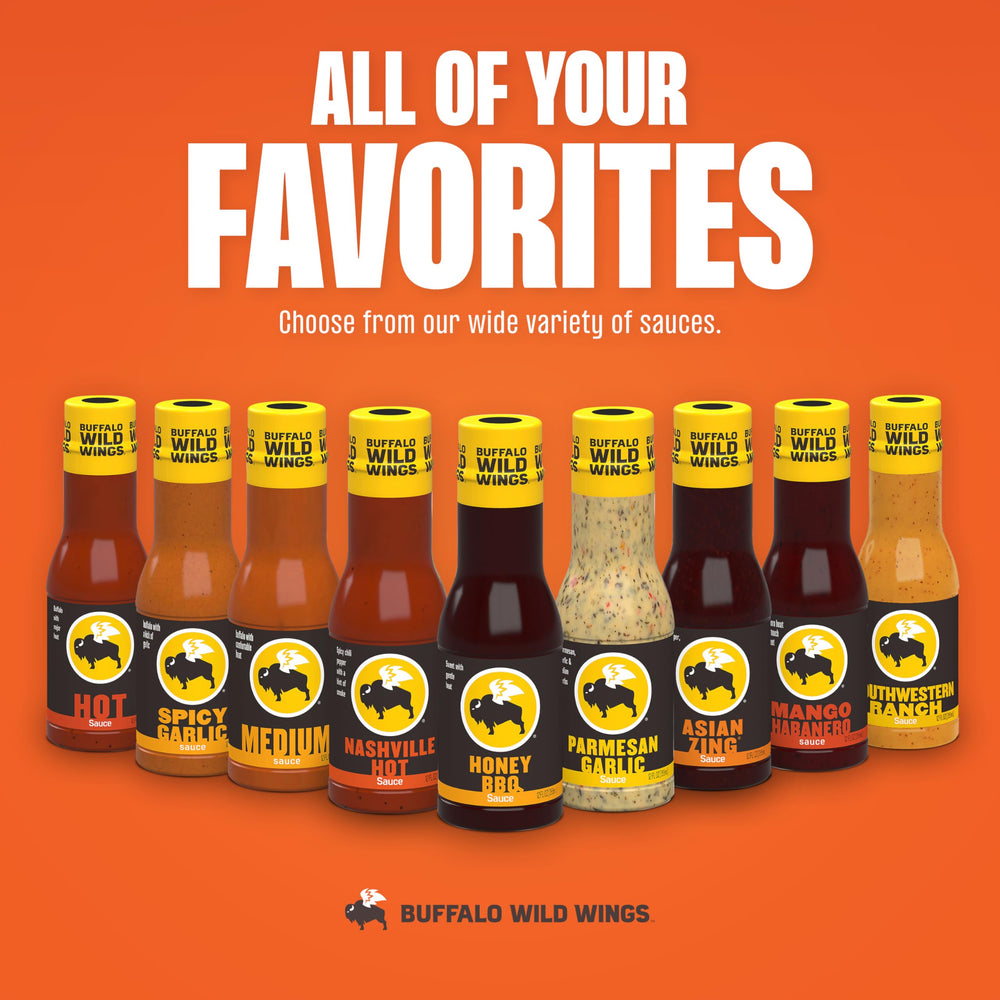 Buffalo Wild Wings Honey BBQ sauce bottle on a dining table setup