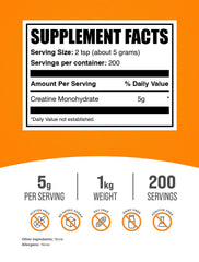 BulkSupplements creatine monohydrate powder scoop, micronized texture for smooth shakes.