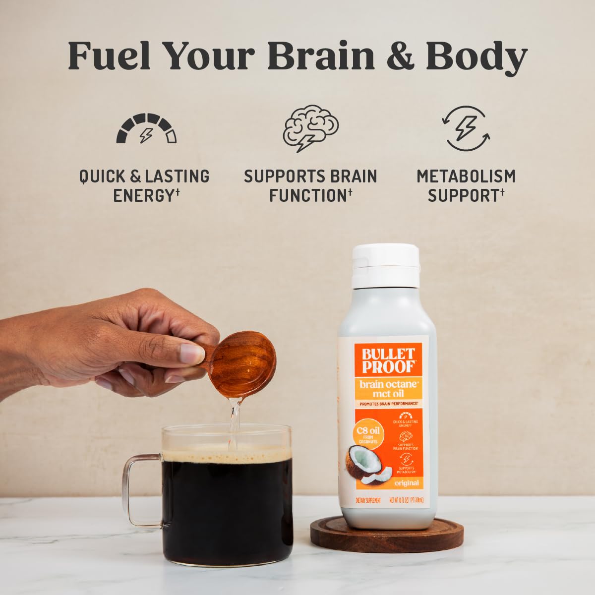 Bulletproof Brain Octane C8 MCT Oil being poured into a cup