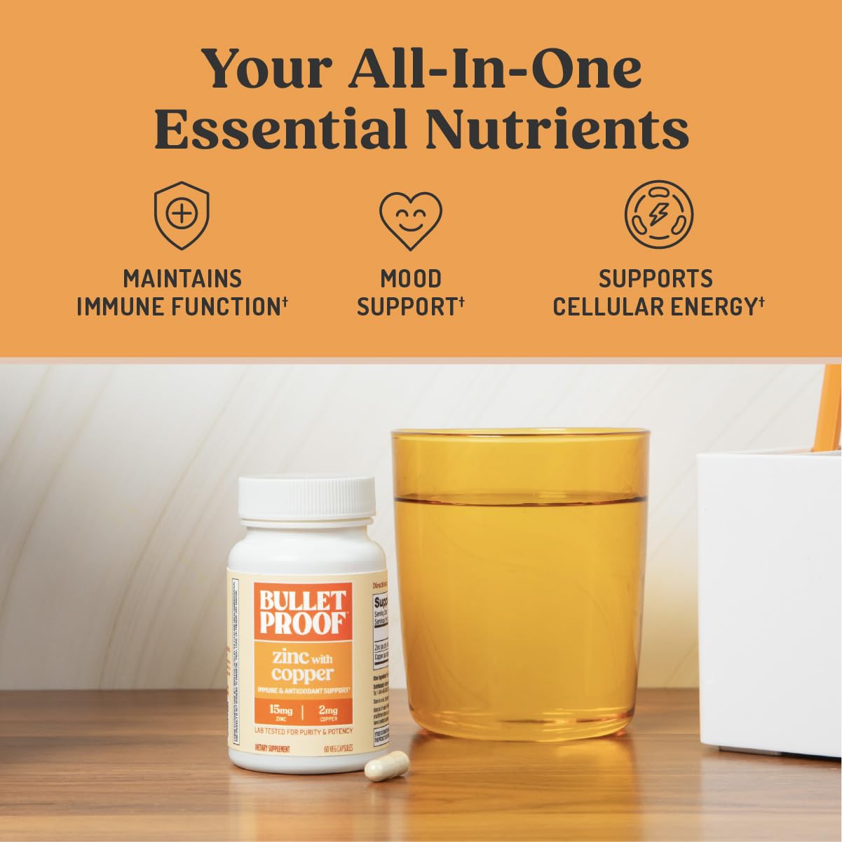 Bulletproof Zinc with Copper capsule on a wooden desk