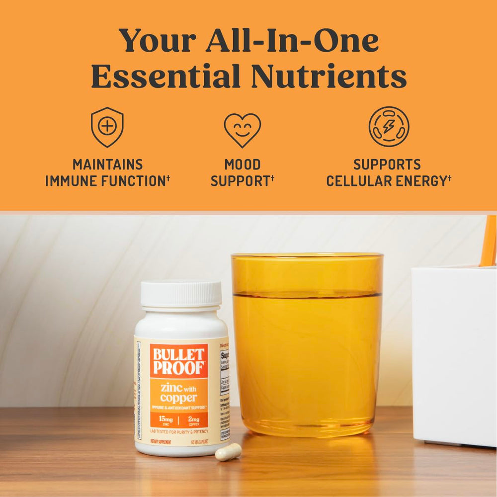 Bulletproof Zinc with Copper capsule on a wooden desk