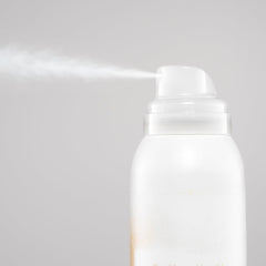 Blondish tinted dry shampoo on roots refreshing color for blonde to light brown hair