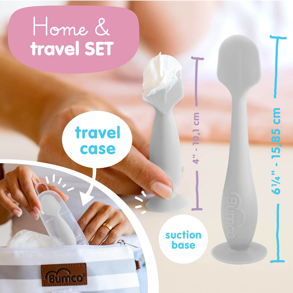 Bumco suction base keeps spatula upright during diaper changes