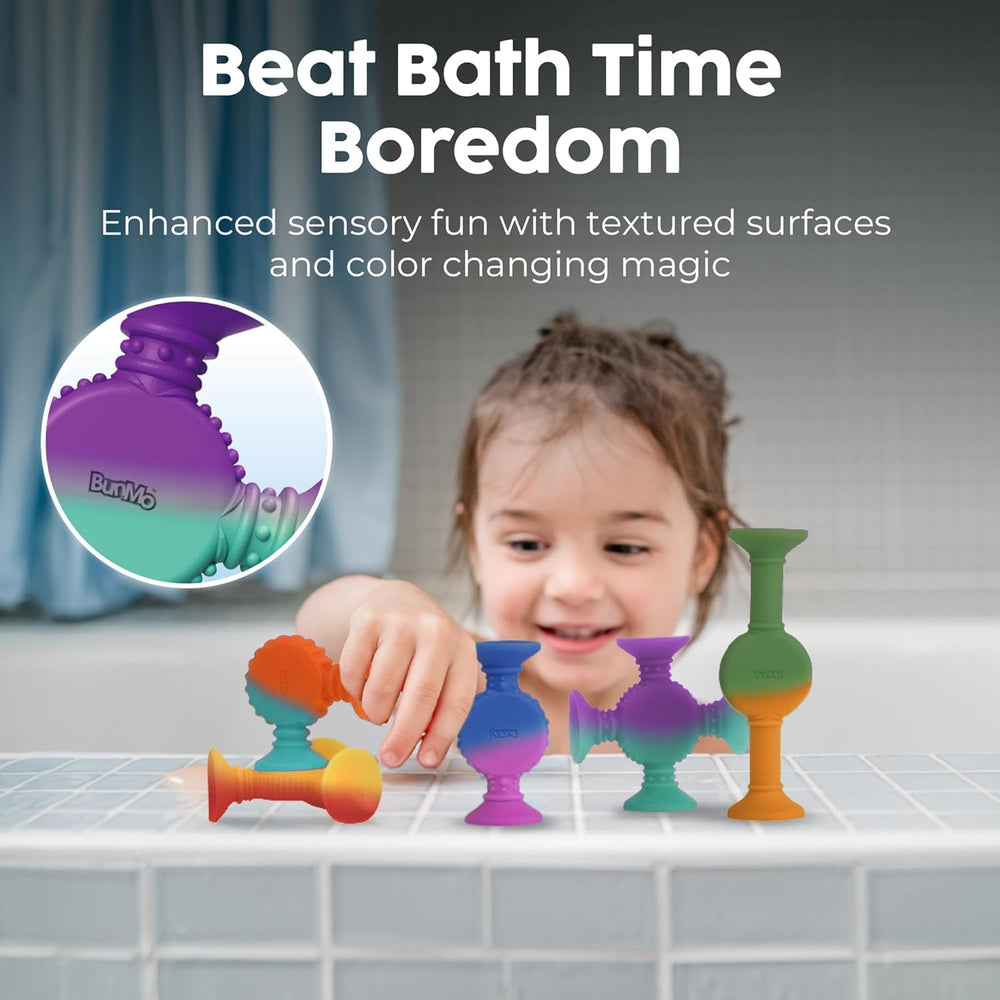 BUNMO suction-cup bath toy on tub surface encourages stick-and-play.