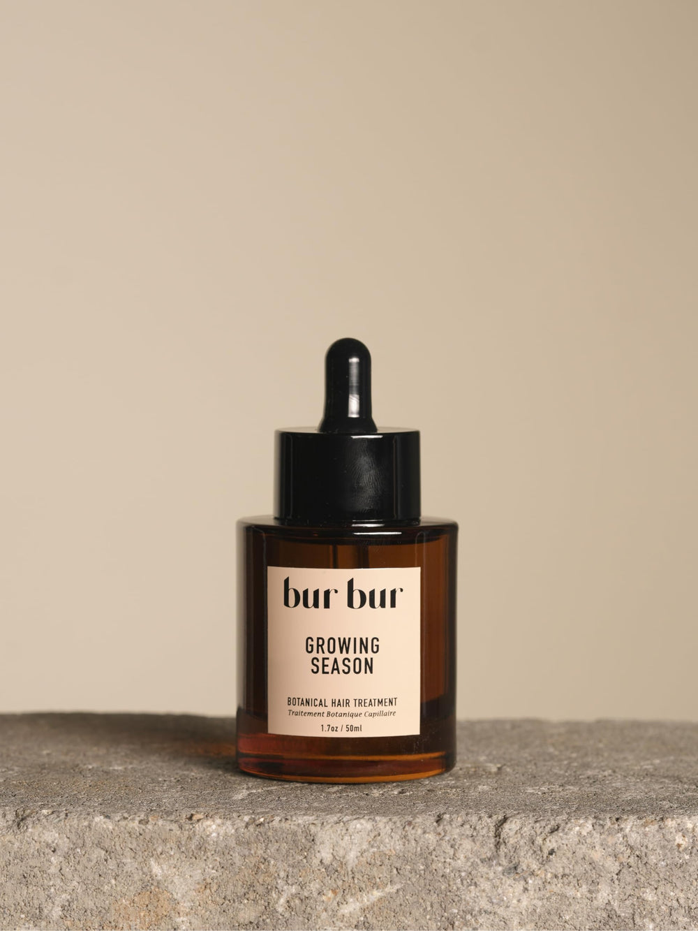 Bur Bur Growing Season oil bottle front view shows a nourishing scalp care option