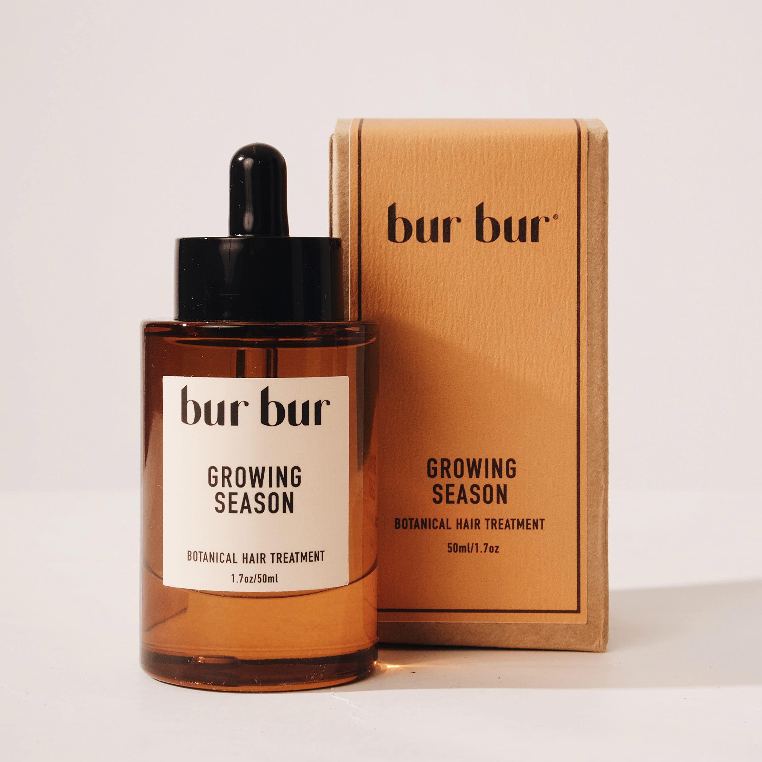 Packaging display emphasizes clean, natural Bur Bur Growing Season oil