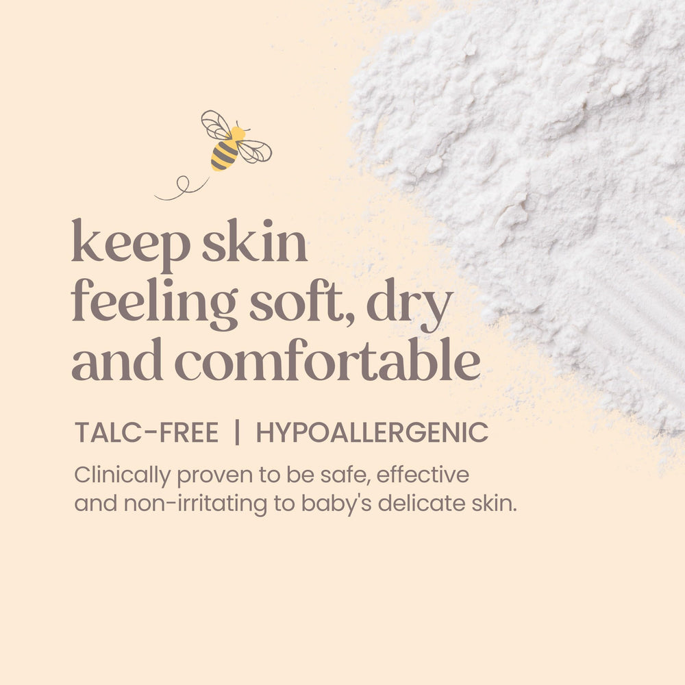 Burt's Bees Baby Dusting Powder close-up of cornstarch-absorbent texture.