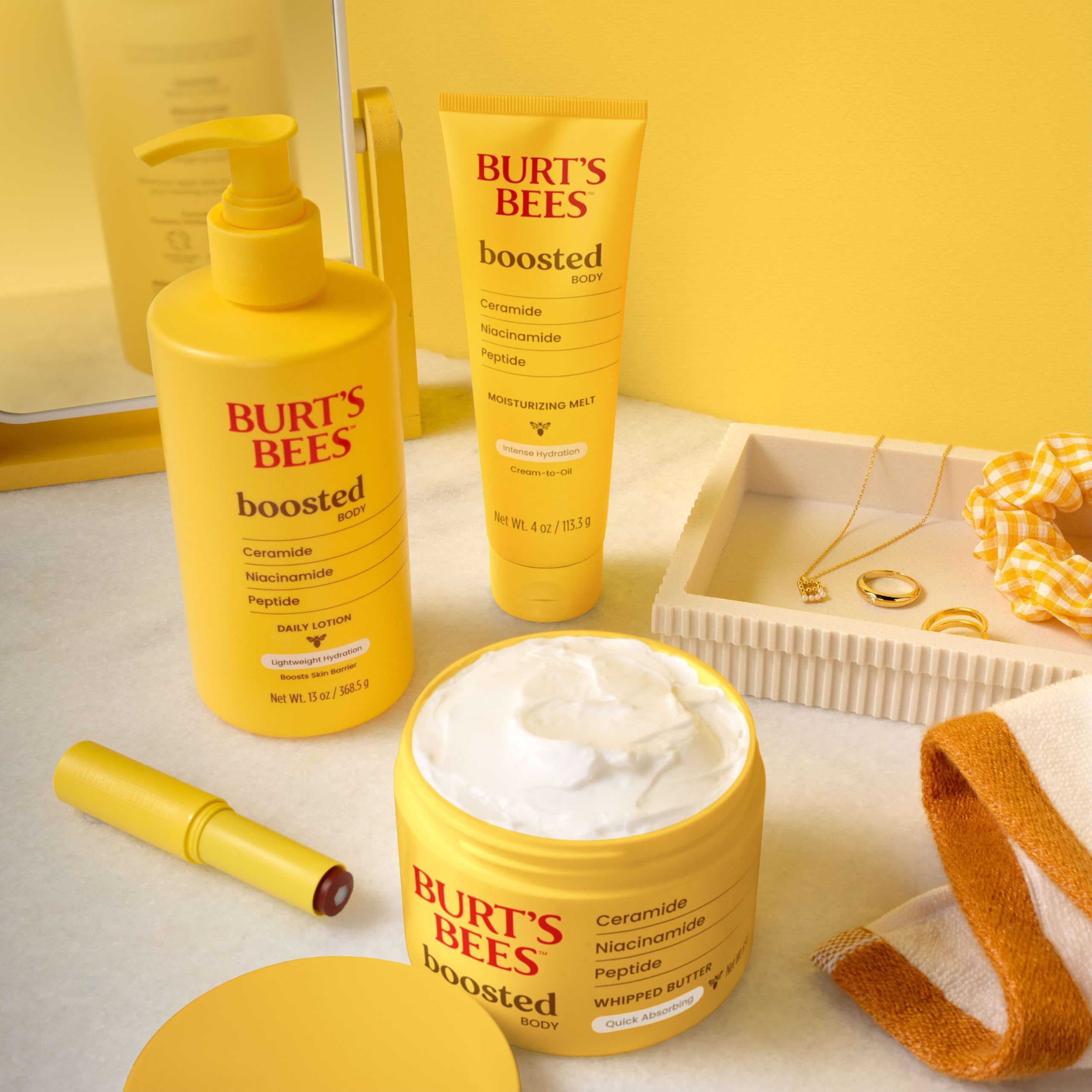 Burt's Bees Boosted Body Whipped Butter 6.5 oz jar on display