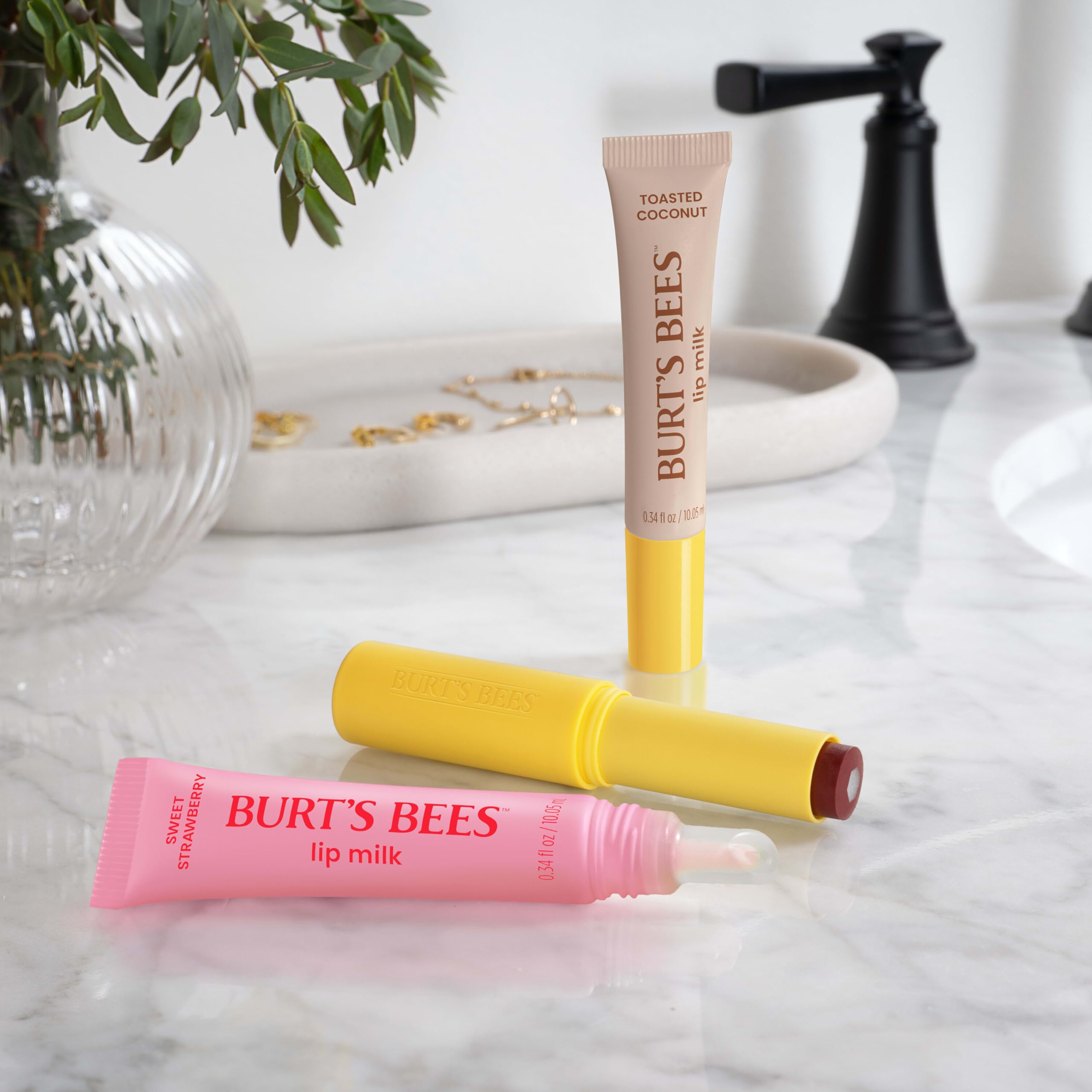 Morning and midday touch-ups with Burt's Bees Lip Milk.