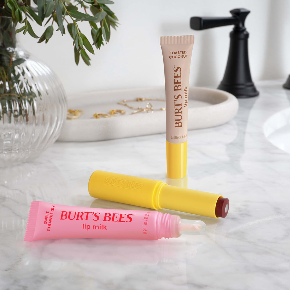 Morning and midday touch-ups with Burt's Bees Lip Milk.