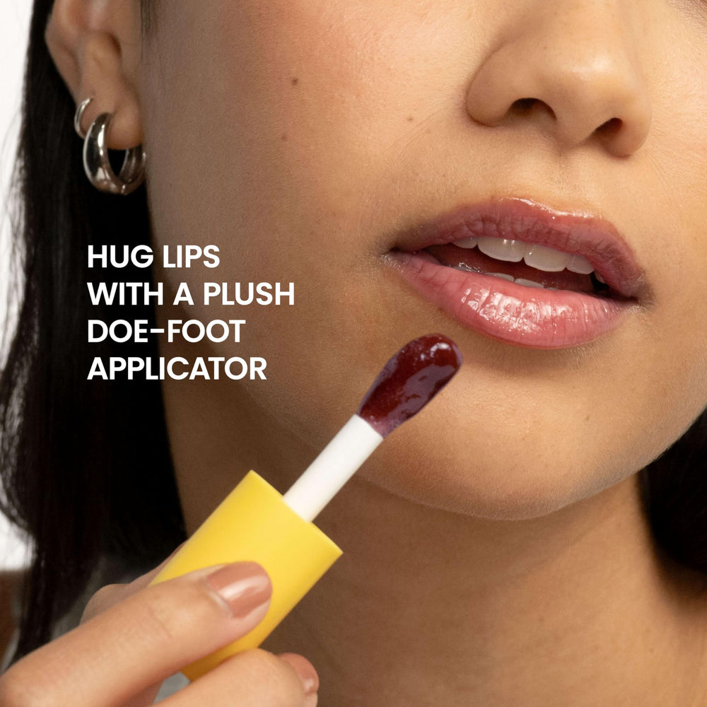 Burts Bees Lip Oil Plum Twilight ingredients list features jojoba oil and vitamin E.