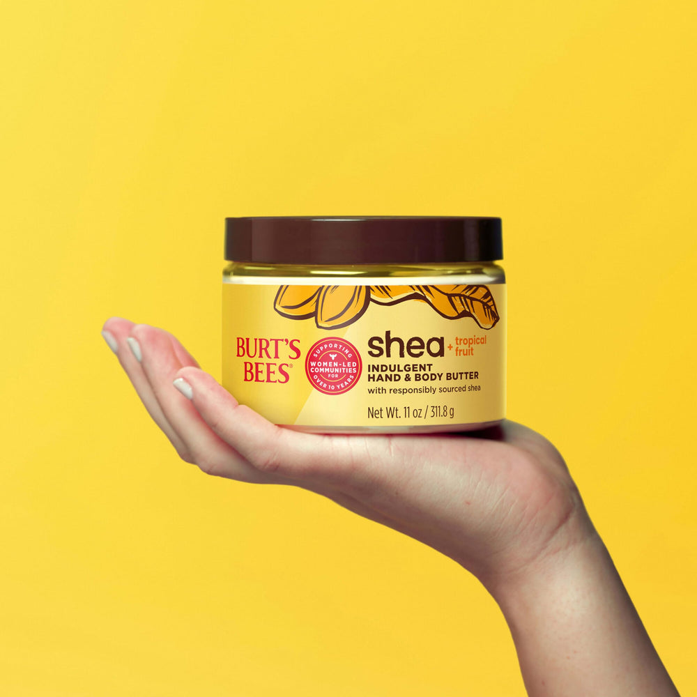 Burts Bees Shea Tropical Fruit Butter body-cream on forearm showing hydration.