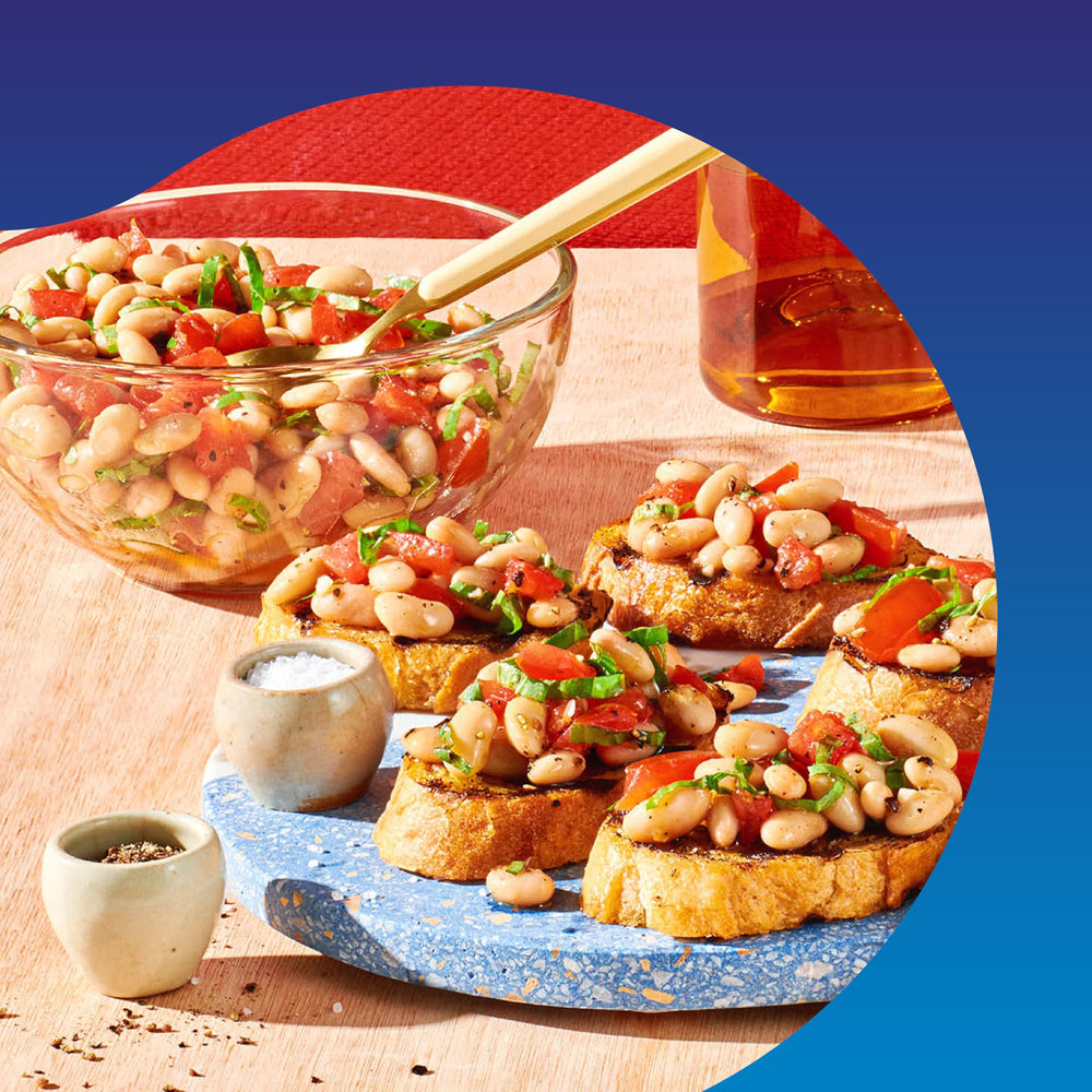Bush's Best Great Northern Beans in a serving bowl with rice for balance.