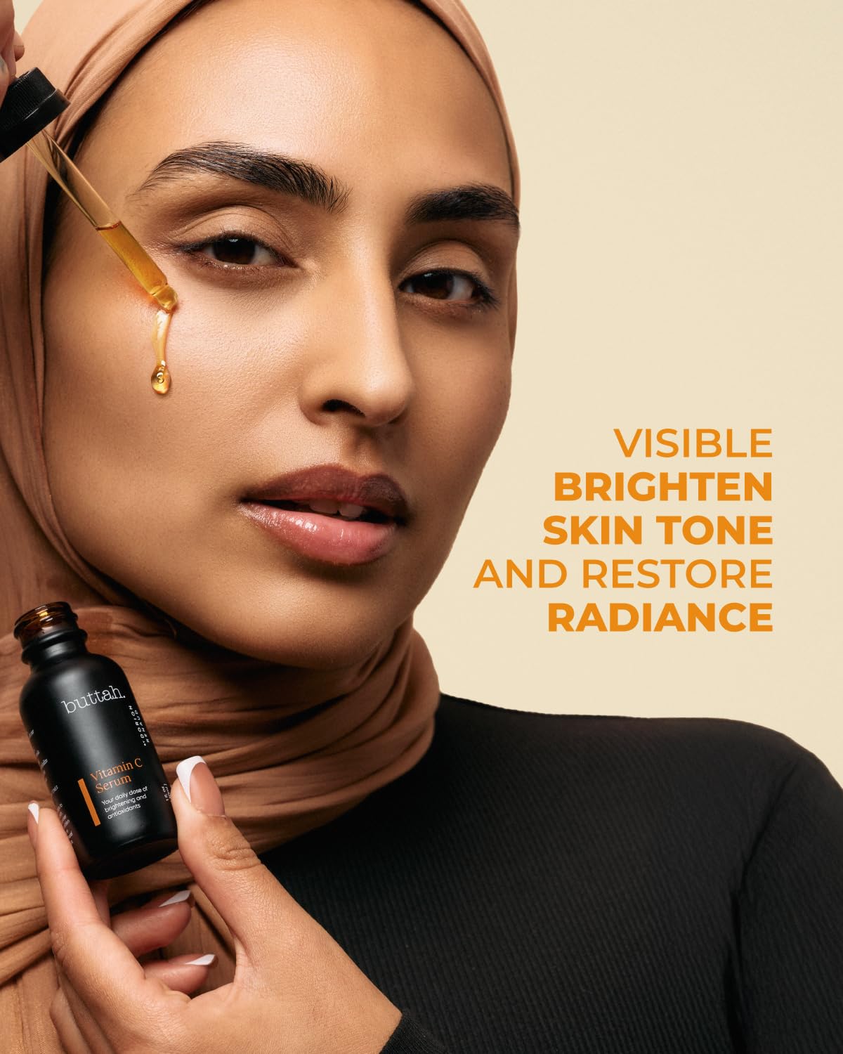 Buttah Skin Vitamin C Serum texture close-up on skin.