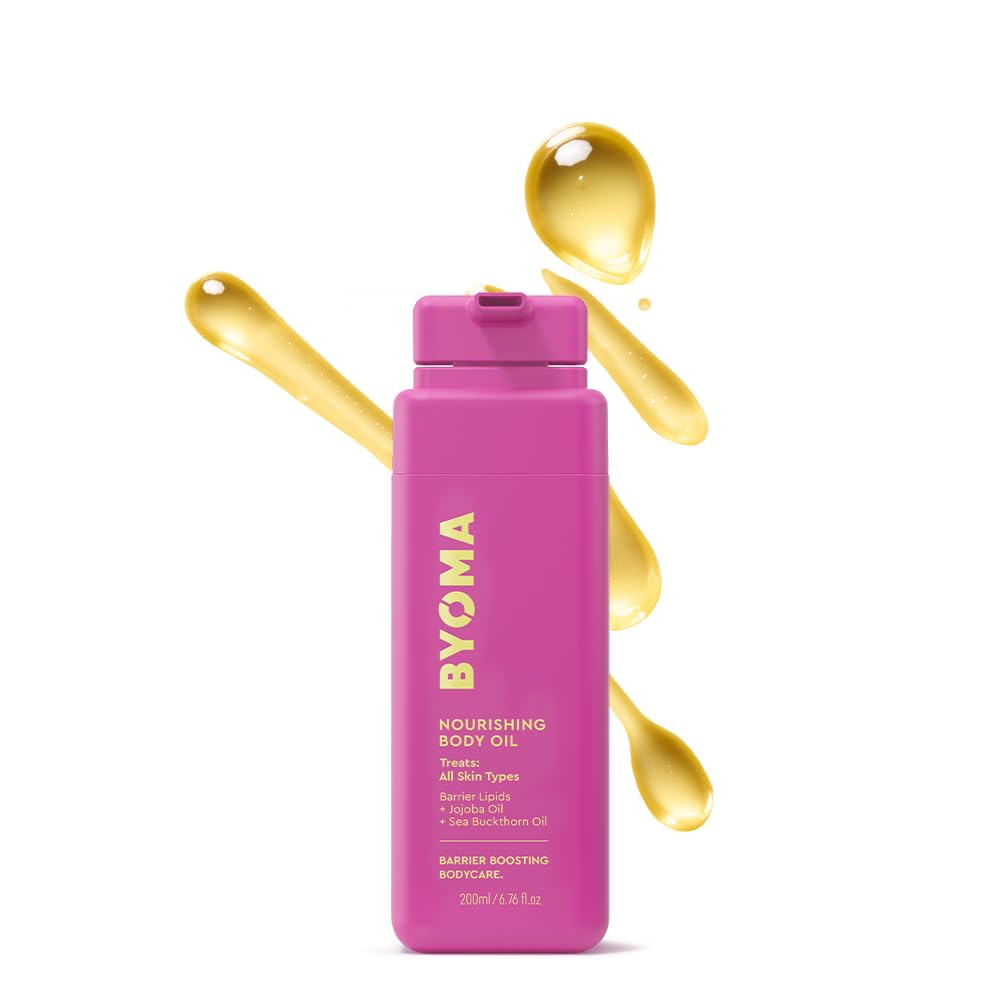 BYOMA Nourishing Body Oil bottle pouring for fast hydration and radiant skin.