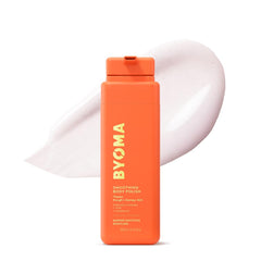 BYOMA Smoothing Body Polish exfoliation close-up shows gentle beads for renewed skin texture.