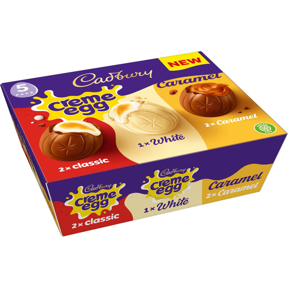 Cadbury caramel creme egg close-up: glossy shell and caramel filling