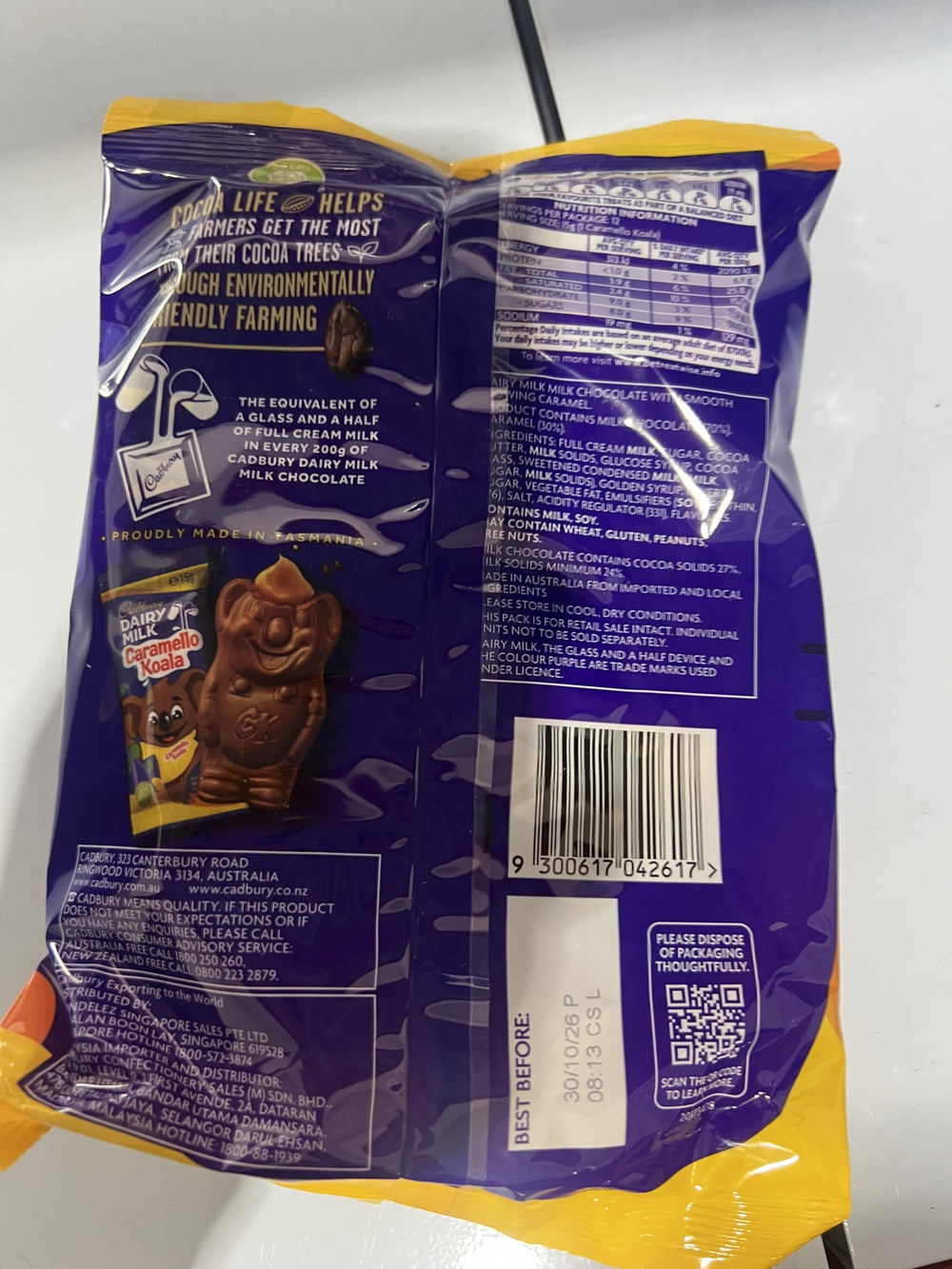 Caramel center visible through smooth milk chocolate in a Cadbury Caramello Koala bite.