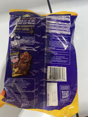 Caramel center visible through smooth milk chocolate in a Cadbury Caramello Koala bite.