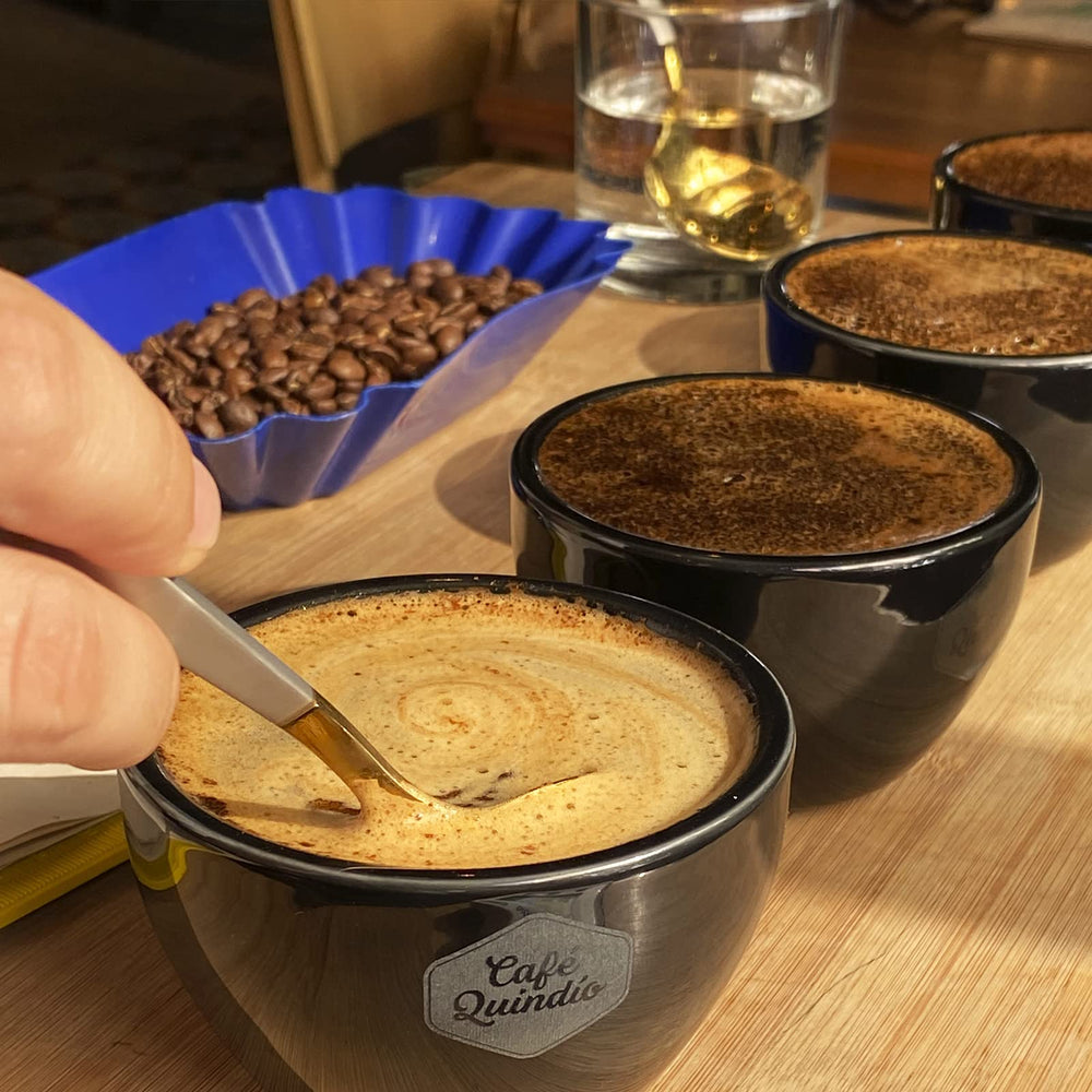 Cafe Quindio brew pour-over scene, inviting a clean, aromatic tasting experience