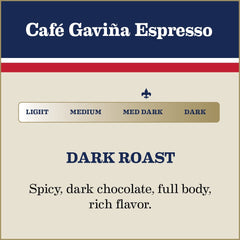 Café Gaviña espresso shot pouring crema with dark roast notes.