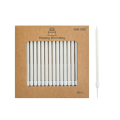 CAKE CODE pearl white long candles on a cake for elegant celebrations