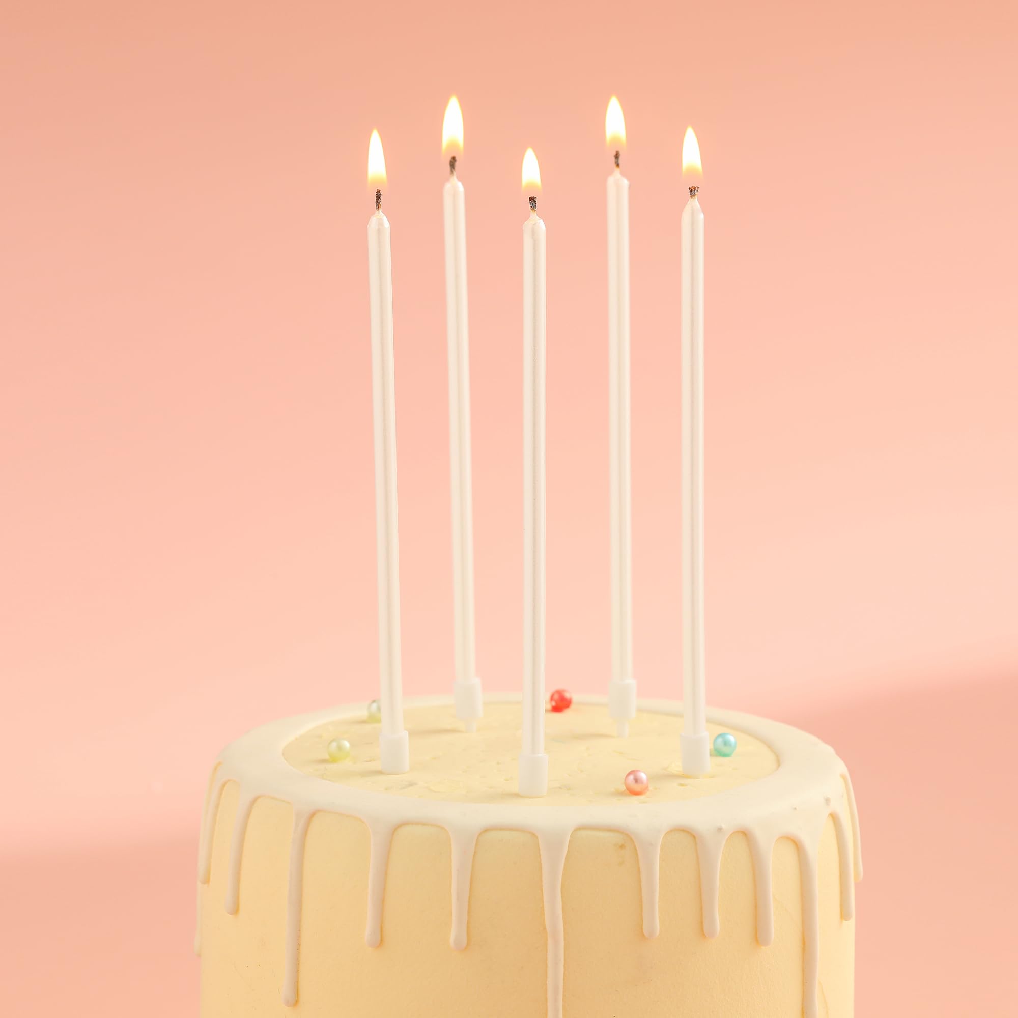 CAKE CODE long candles with holder keeping wax off the cake surface