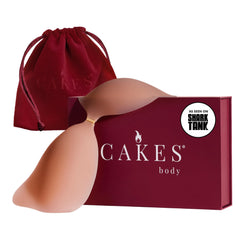 CAKES Body adhesive strapless bra front close-up showing silicone cups for flattering cleavage.