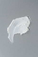 California Born Days of Dirt hair-application close-up shows versatile use on damp or dry hair.