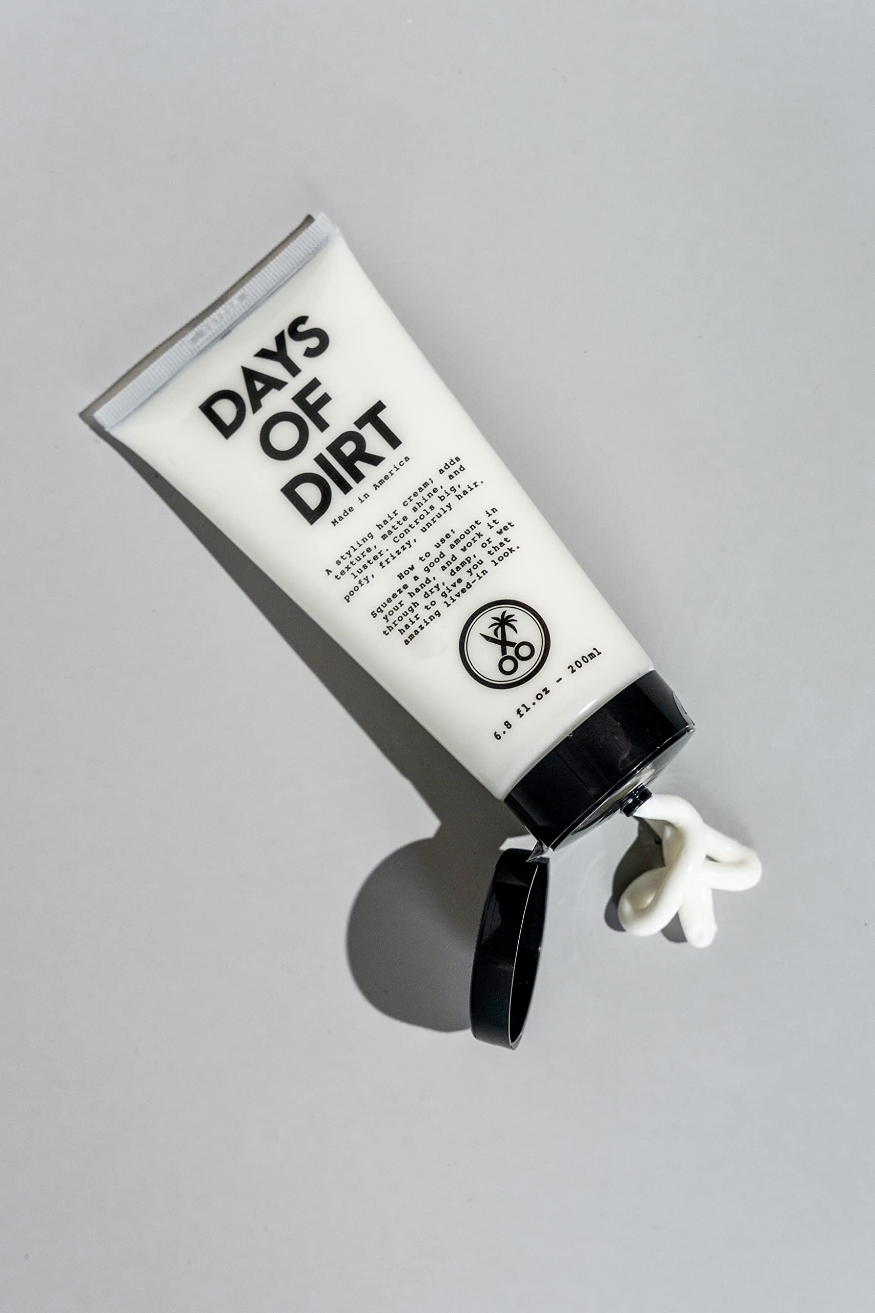California Born Days of Dirt texture result reveals lifted, lived-in look with frizz control.