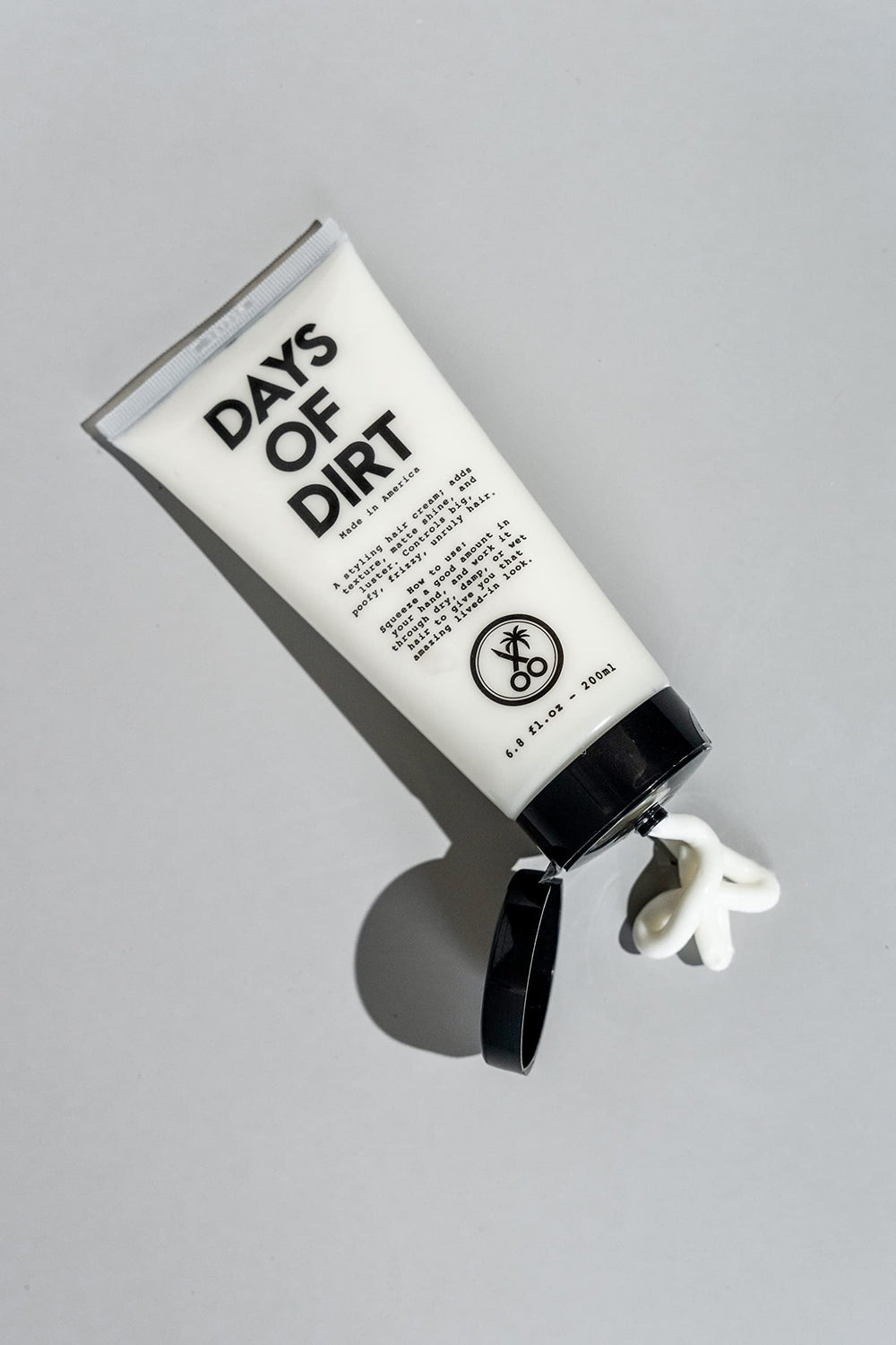 California Born Days of Dirt texture result reveals lifted, lived-in look with frizz control.