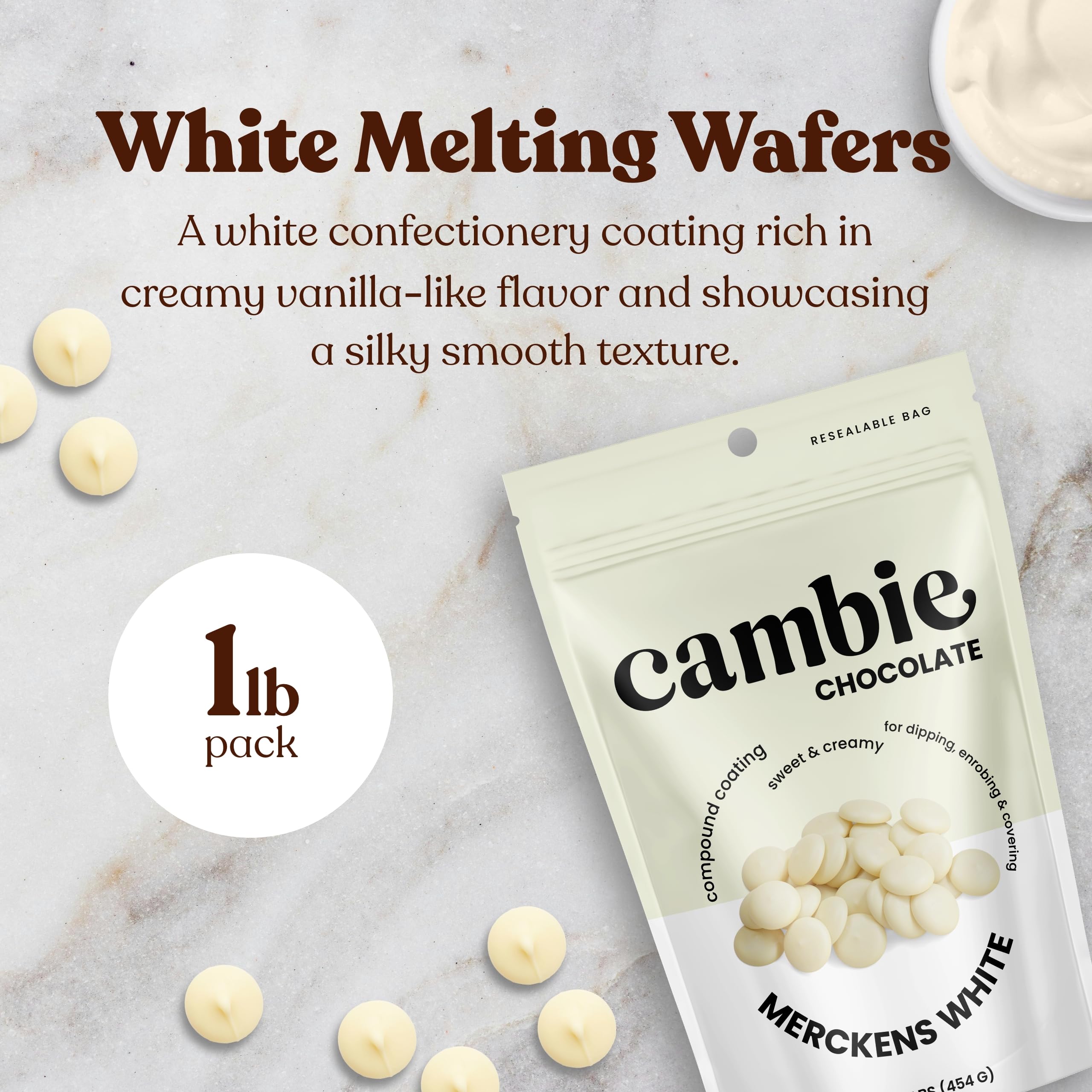 Cambie Merckens white melting chocolate wafers used to dip strawberries with gloss.