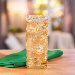 Pouring Canada Dry Zero Sugar Cherry Ginger Ale into a chilled glass.