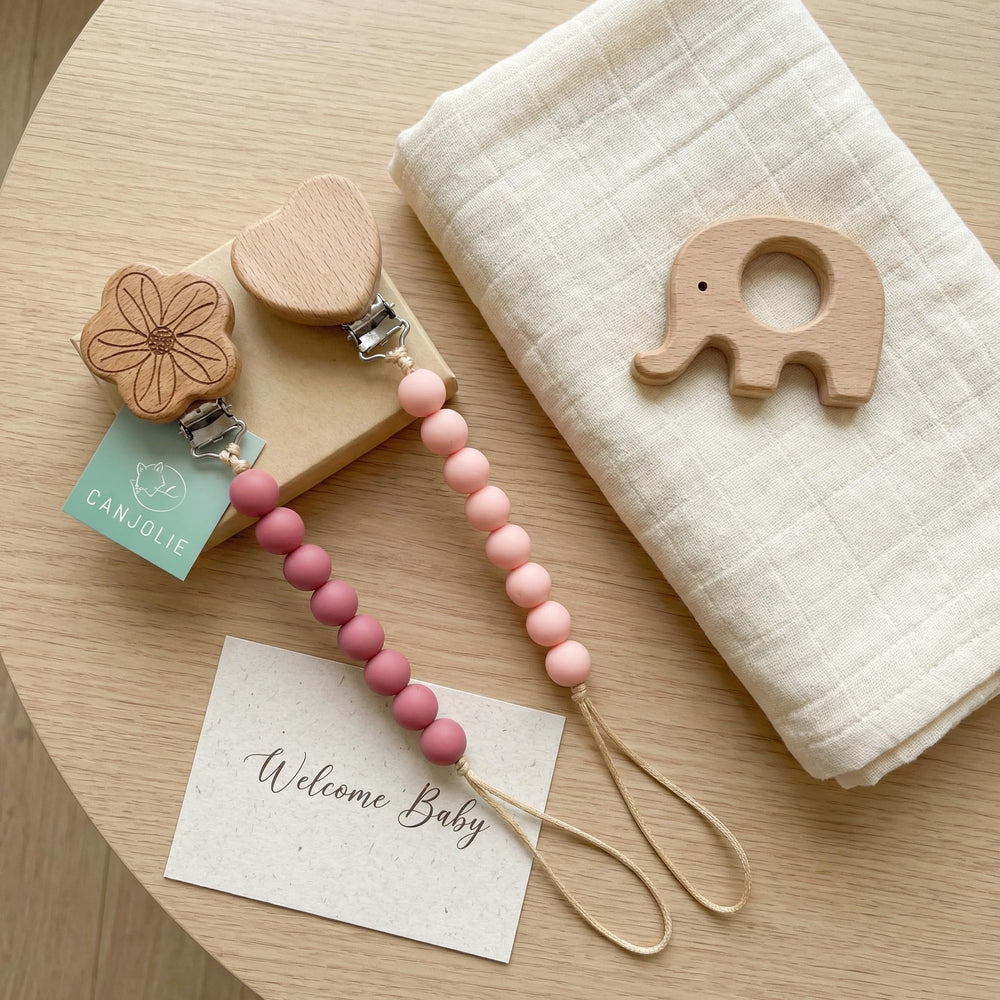 Close-up shows bead shapes to stimulate baby's senses during outings.