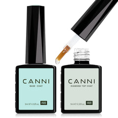 CANNI base and top coat bottles on a clean surface showing a professional home manicure setup
