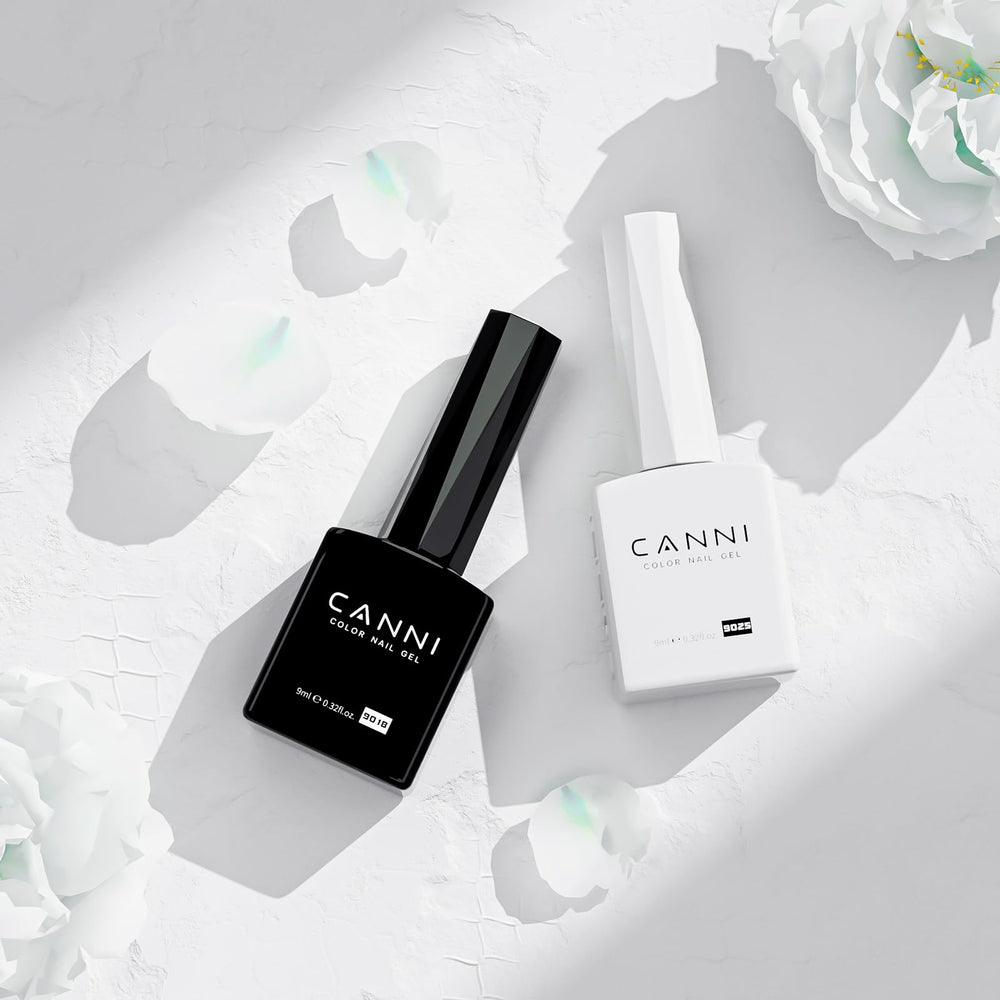 CANNI black gel polish on nails with even coverage.