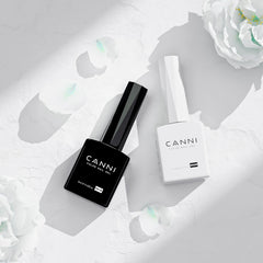 CANNI black gel polish on nails with even coverage.